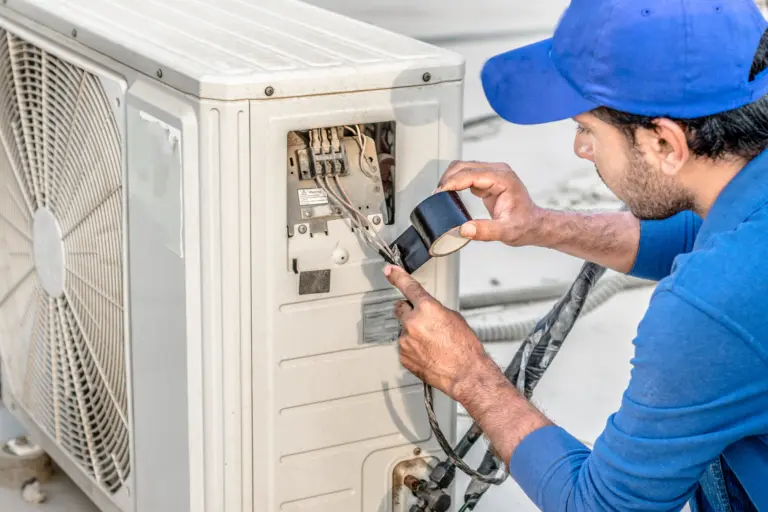 Hvac Technician Fixing Ac Unit Vito Services 768x512 1