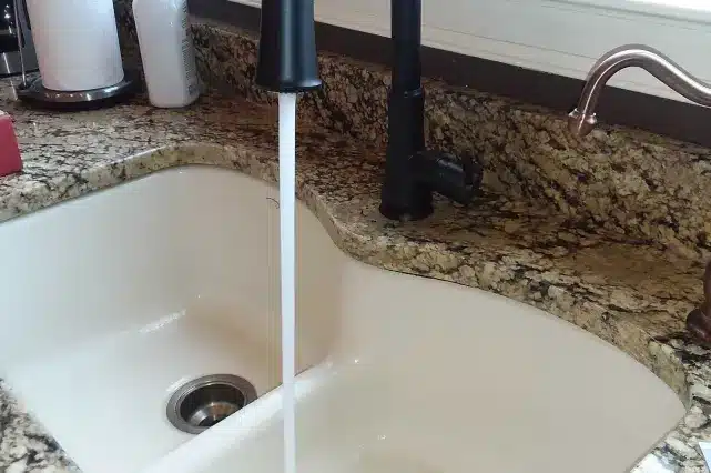 Vito Plumber Dennell Installs New Kitchen Faucet Works Great Vito Services 641x426 1