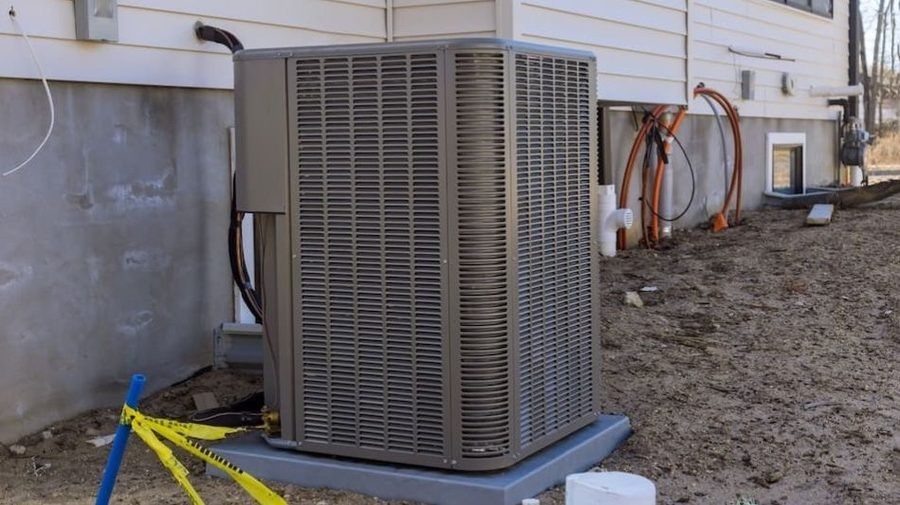 HVAC unit installed to the exterior of the home.