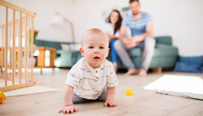 Baby Crawling On Clean Floor