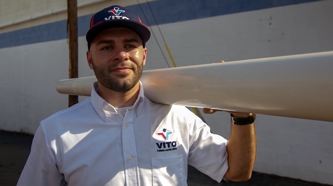 Vito Technician Holding Piping 1 Vito Technician Holding Piping 1